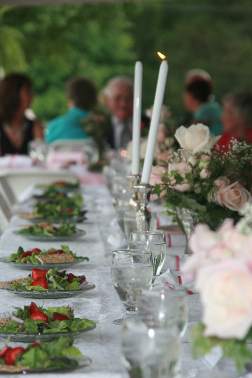 The table for the bridal party.  That candle never fell over, so I guess it was either fixed or...